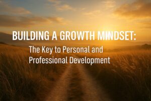 “A golden sunrise over a winding path through tall grasses, with bold text overlay reading ‘Building A Growth Mindset: The Key to Personal and Professional Development